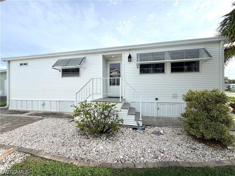 2 bedroom ManufacturedHome at 4580 Slash Pine Way E, Riverwoods Plantation, Estero — photo 2