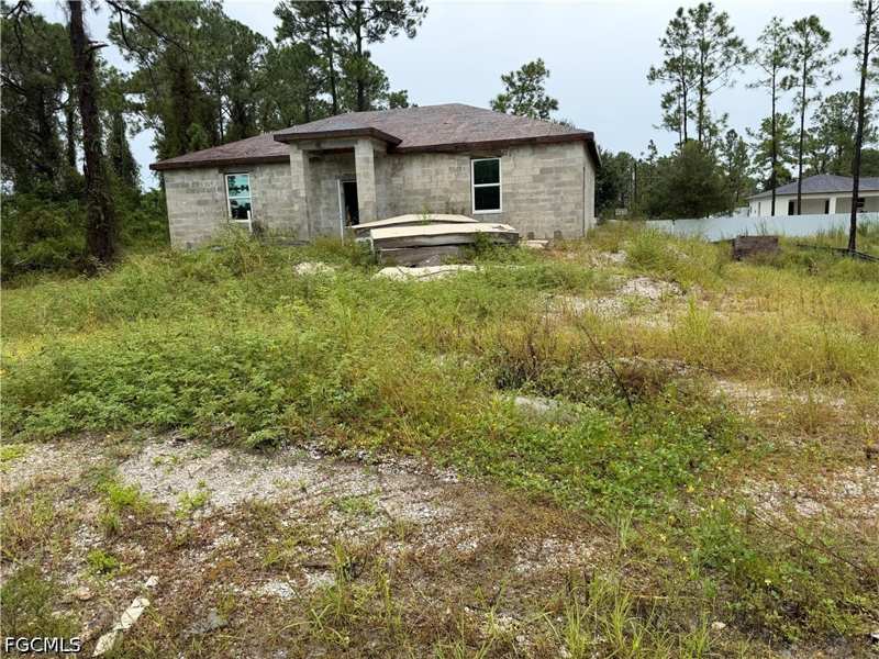 bedroom SingleFamilyResidence at 857 Adler St E, Lehigh Acres, Lehigh Acres — photo 1
