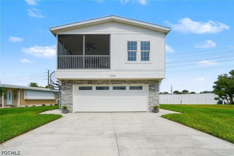 2 bedroom ManufacturedHome at 11220 Bayside Ln, Bayside Estates, Fort Myers Beach — photo 1