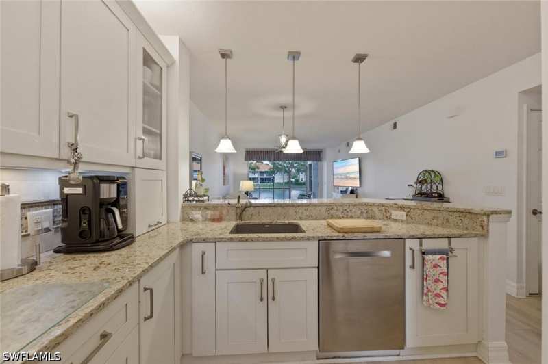 2 bedroom Condominium at 2506 Orchid Bay Dr Z102, Pipers Grove, Naples — photo 1