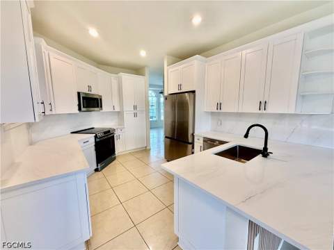 338 Pyramid Ave, Lehigh Acres FL - photo 10 of 38