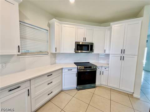 338 Pyramid Ave, Lehigh Acres FL - photo 12 of 38
