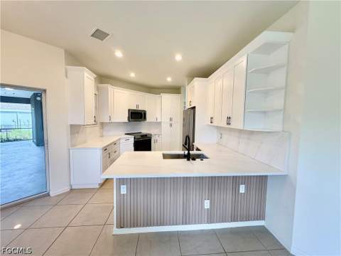 338 Pyramid Ave, Lehigh Acres FL - photo 8 of 38