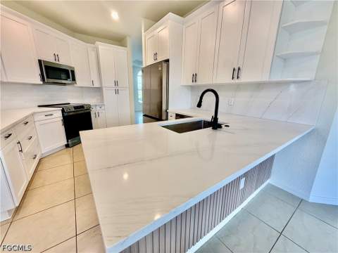 338 Pyramid Ave, Lehigh Acres FL - photo 9 of 38