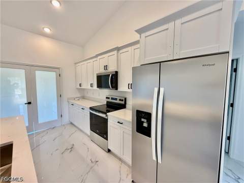 1203 Truman Ave, Lehigh Acres FL - photo 7 of 27