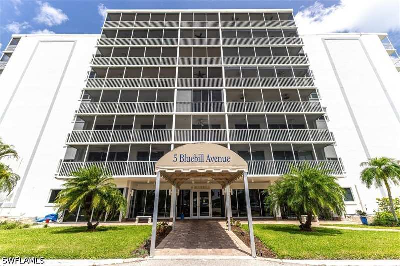 bedroom Condominium at 5 Bluebill Ave 105, Vanderbilt Towers, Naples — photo 1