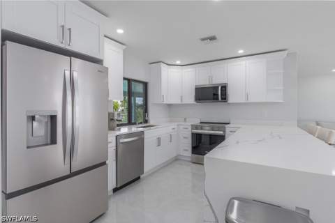 233 NW 11th Ter, Cape Coral FL - photo 8 of 35