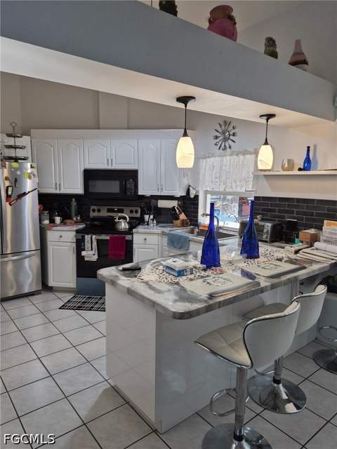 401 Hibiscus Ave, Lehigh Acres FL - photo 16 of 24