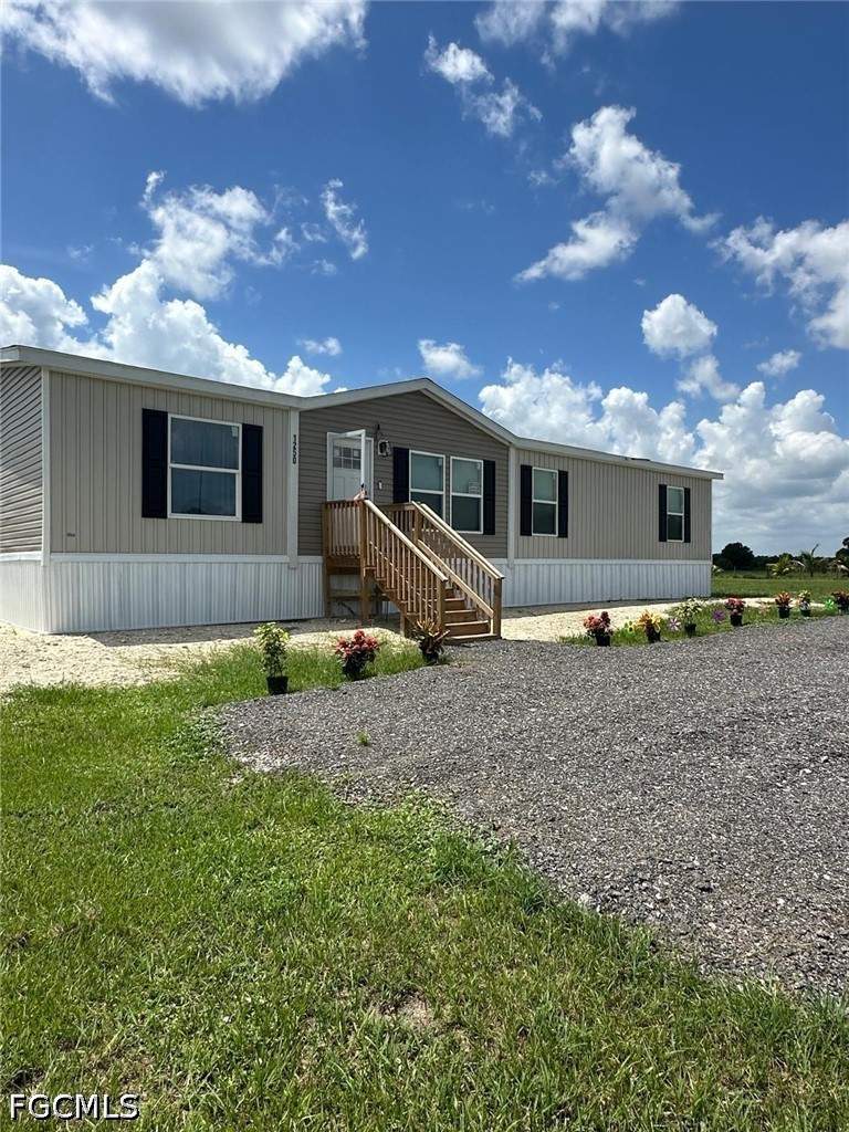 4 bedroom ManufacturedHome at 1250 Homestead Ave, Pioneer Plantation, Clewiston — photo 2