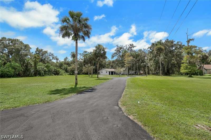 3 bedroom SingleFamilyResidence at 241 20th St NE, Golden Gate Estates, Naples — photo 1