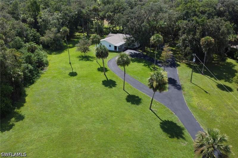 3 bedroom SingleFamilyResidence at 241 20th St NE, Golden Gate Estates, Naples — photo 2