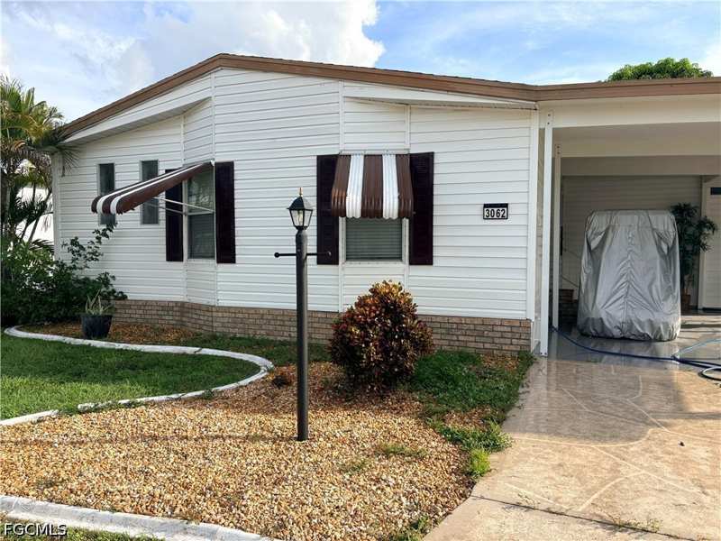 2 bedroom ManufacturedHome at 3062 Artesian Ln, Lake Arrowhead Mob Village, North Fort Myers — photo 1