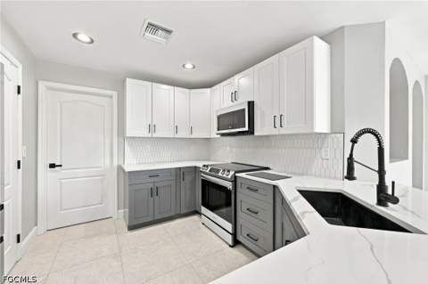 1230 NW 14th Ave, Cape Coral FL - photo 11 of 41