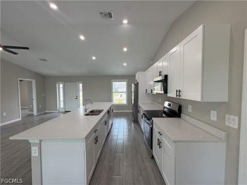 1410 NE Juanita Pl, Cape Coral FL - photo 11 of 16