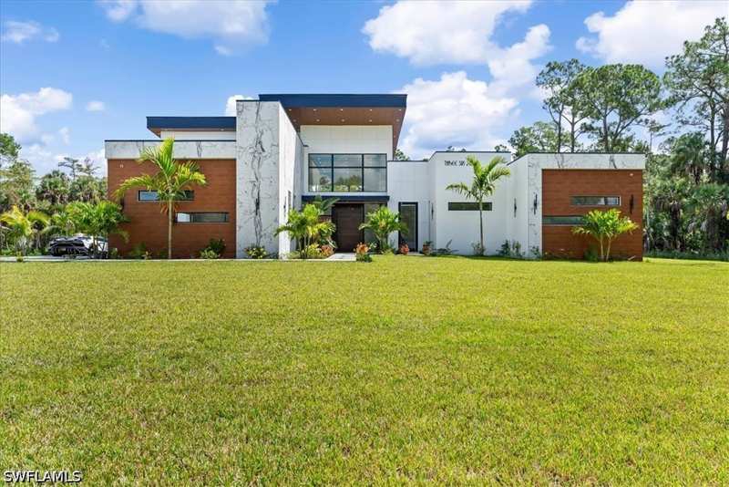 4 bedroom SingleFamilyResidence at 360 3rd St NW, Golden Gate Estates, Naples — photo 1