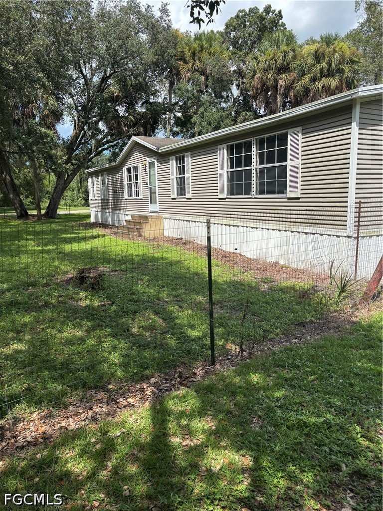 3 bedroom ManufacturedHome at 1415 Forest Ln, Pioneer Plantation, Clewiston — photo 1