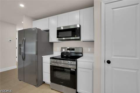 1026 Halby Ave S, Lehigh Acres FL - photo 12 of 35