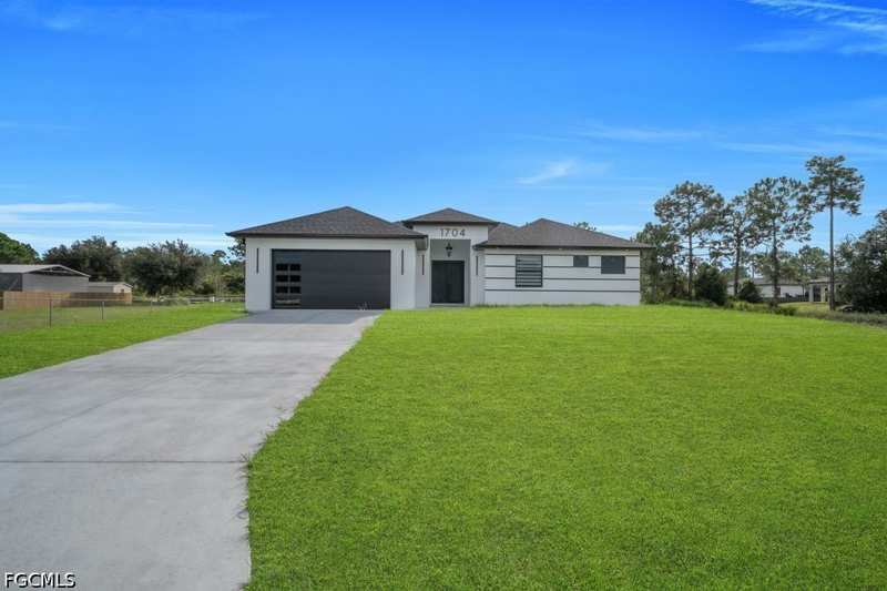 4 bedroom SingleFamilyResidence at 1704 Clayton Ave, Lehigh Acres, Lehigh Acres — photo 1