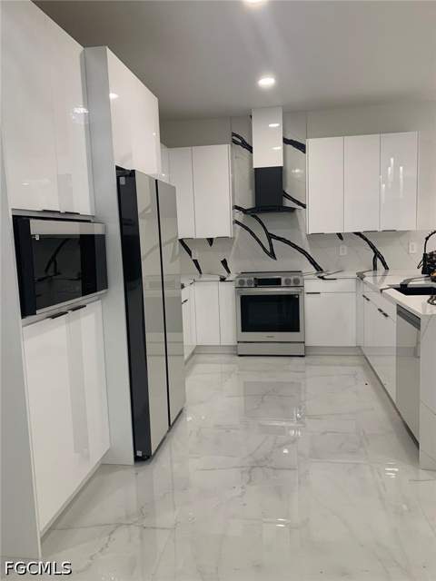 1704 Clayton Ave, Lehigh Acres FL - photo 8 of 31