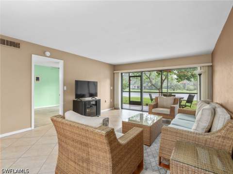 1211 Commonwealth Cir C - 104, Naples FL - photo 6 of 31