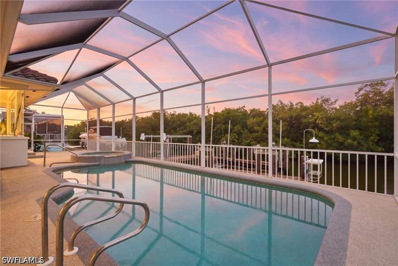 4 bedroom SingleFamilyResidence at 211 Flamingo Ave, Conners, Naples — photo 2