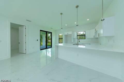 719 Almelia St E, Lehigh Acres FL - photo 16 of 49