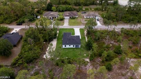 719 Almelia St E, Lehigh Acres FL - photo 6 of 49