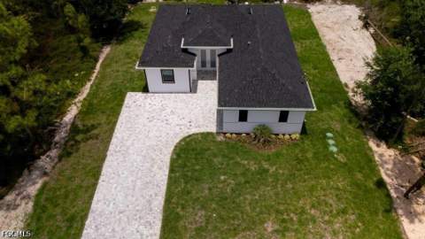 719 Almelia St E, Lehigh Acres FL - photo 7 of 49