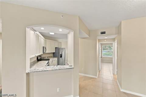 6610 Huntington Lakes Cir 103, Naples FL - photo 10 of 43