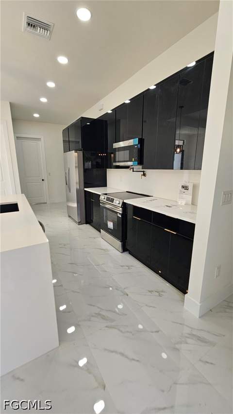 912 Hibiscus Ave, Lehigh Acres FL - photo 6 of 31
