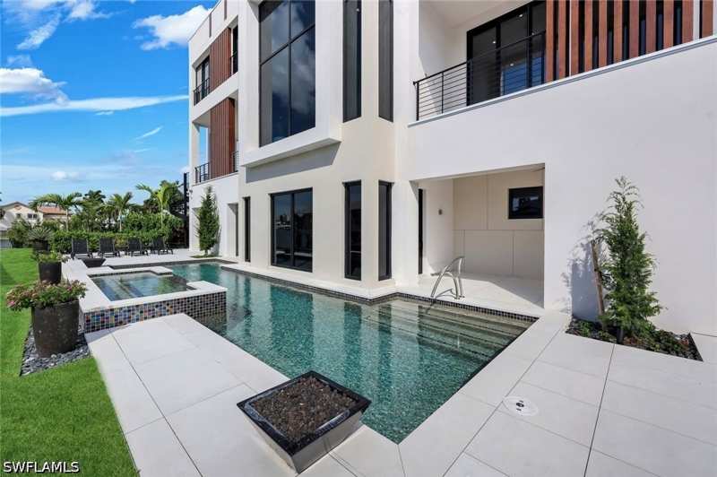 4 bedroom SingleFamilyResidence at 348 Seagull Ave, Conners, Naples — photo 1