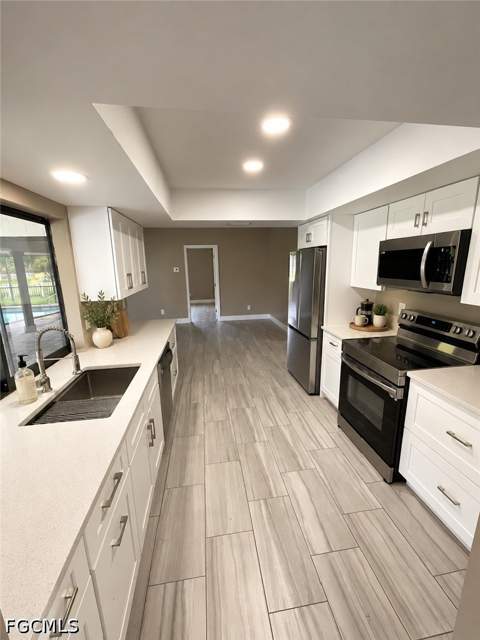 105 Jefferson Ave, Lehigh Acres FL - photo 9 of 35