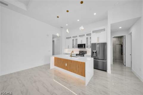 1029 NW 24th Pl, Cape Coral FL - photo 7 of 47