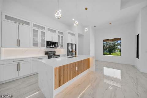 1029 NW 24th Pl, Cape Coral FL - photo 9 of 47