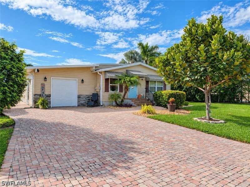 3 bedroom ManufacturedHome at 113 Audubon Rd, Riverwood, Naples — photo 1