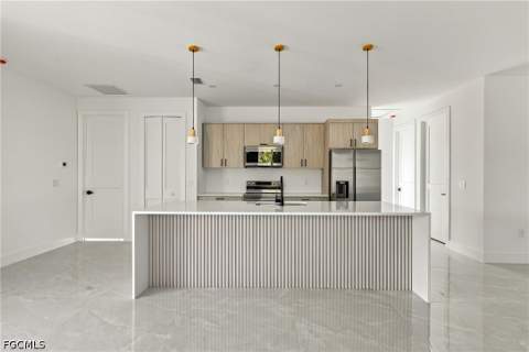 704 Avondale St E, Lehigh Acres FL - photo 10 of 52