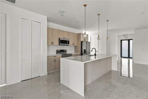 704 Avondale St E, Lehigh Acres FL - photo 11 of 52