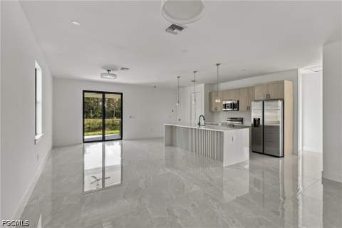 704 Avondale St E, Lehigh Acres FL - photo 12 of 52