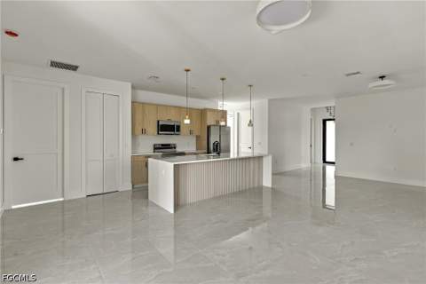 704 Avondale St E, Lehigh Acres FL - photo 13 of 52