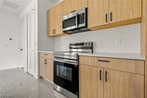 704 Avondale St E, Lehigh Acres FL - photo 6 of 52