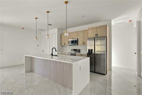 704 Avondale St E, Lehigh Acres FL - photo 8 of 52