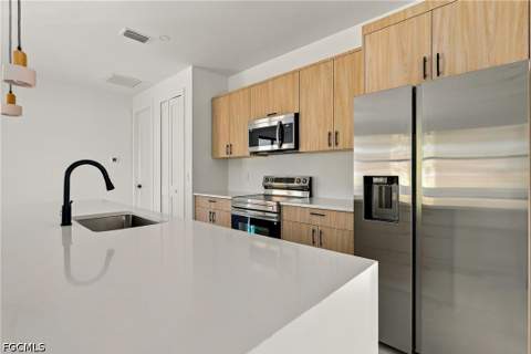 704 Avondale St E, Lehigh Acres FL - photo 9 of 52