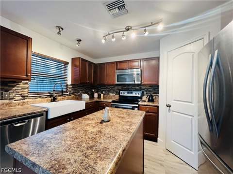 2208 SW 32nd St, Cape Coral FL - photo 8 of 49