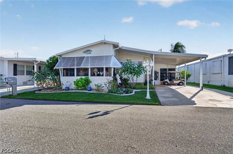 2 bedroom ManufacturedHome at 14510 Paul Revere Loop, Old Bridge Village, North Fort Myers — photo 1