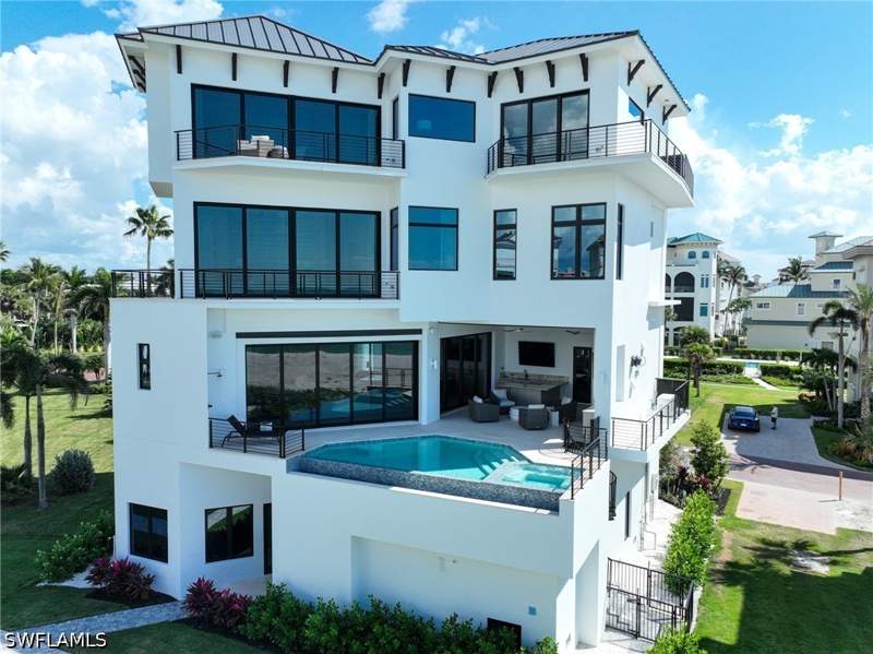 6 bedroom SingleFamilyResidence at 105 Saint Eustacius Ln, Barefoot Beach, Bonita Springs — photo 2