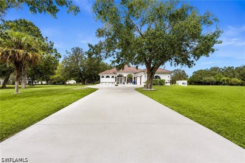 4 bedroom SingleFamilyResidence at 16451 Wildcat Dr, Wildcat Farms, Fort Myers — photo 2