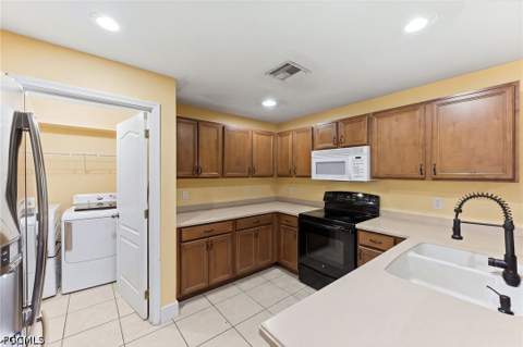1015 Allman Ave, Lehigh Acres FL - photo 10 of 40