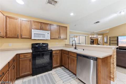 1015 Allman Ave, Lehigh Acres FL - photo 7 of 40