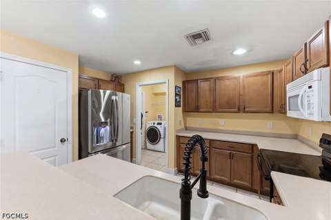 1015 Allman Ave, Lehigh Acres FL - photo 9 of 40