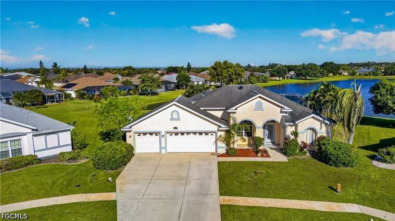 4 bedroom SingleFamilyResidence at 1509 Stadium Ct, Varsity Lakes, Lehigh Acres — photo 1